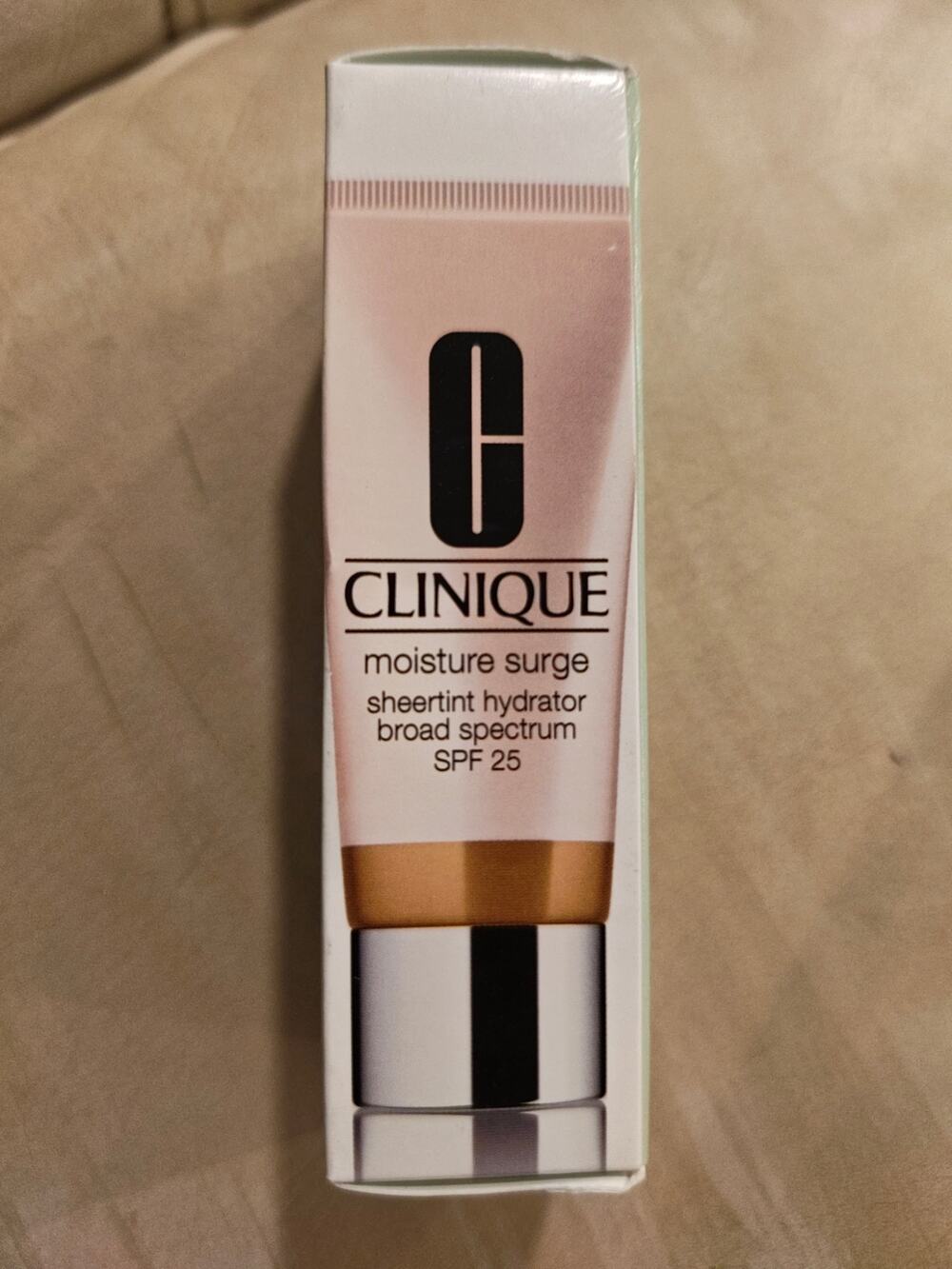 CLINIQUE moisture surge sheertint hydrator broad spectrum SPF 25